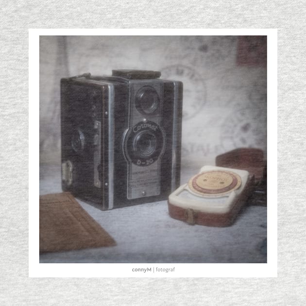 An old vintage camera with external exposure meter, as a poster by connyM-Sweden